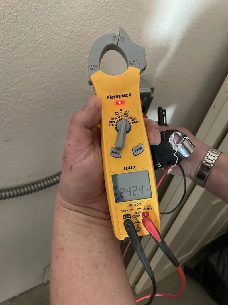 Voltage testing with clamp meter during Generator Installation in Potterville